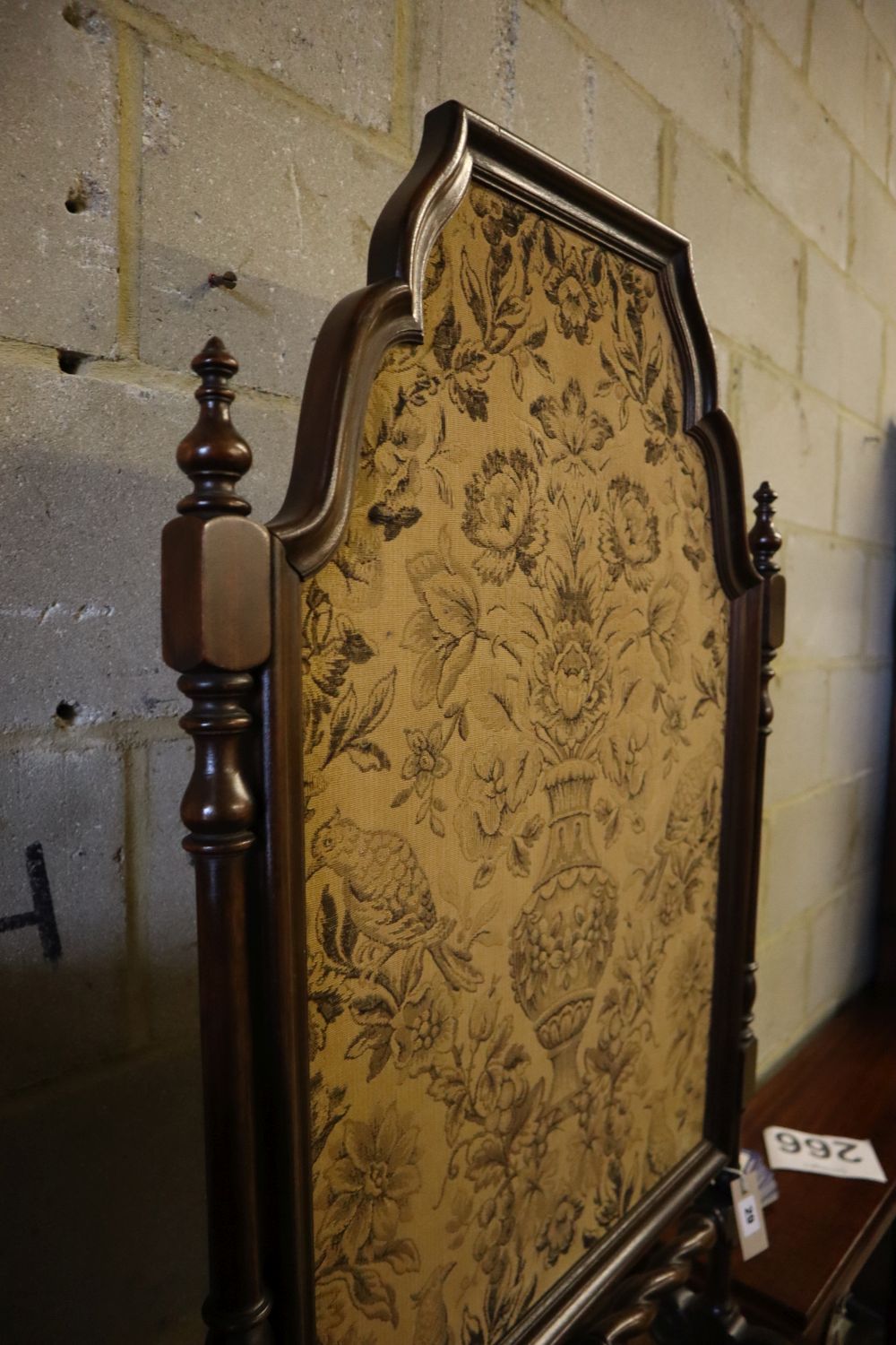 A 1920s mahogany firescreen, width 60cm, height 111cm